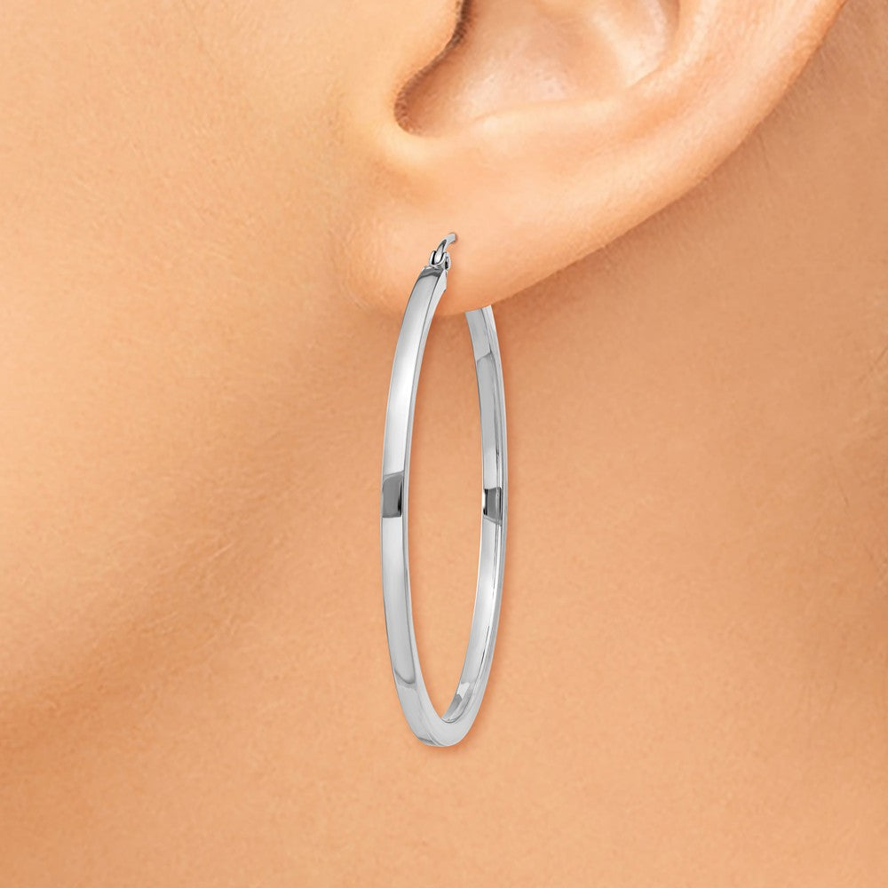 Alternate view of the 2mm, 14k White Gold Square Tube Round Hoop Earrings, 40mm (1 1/2 Inch) by The Black Bow Jewelry Co.