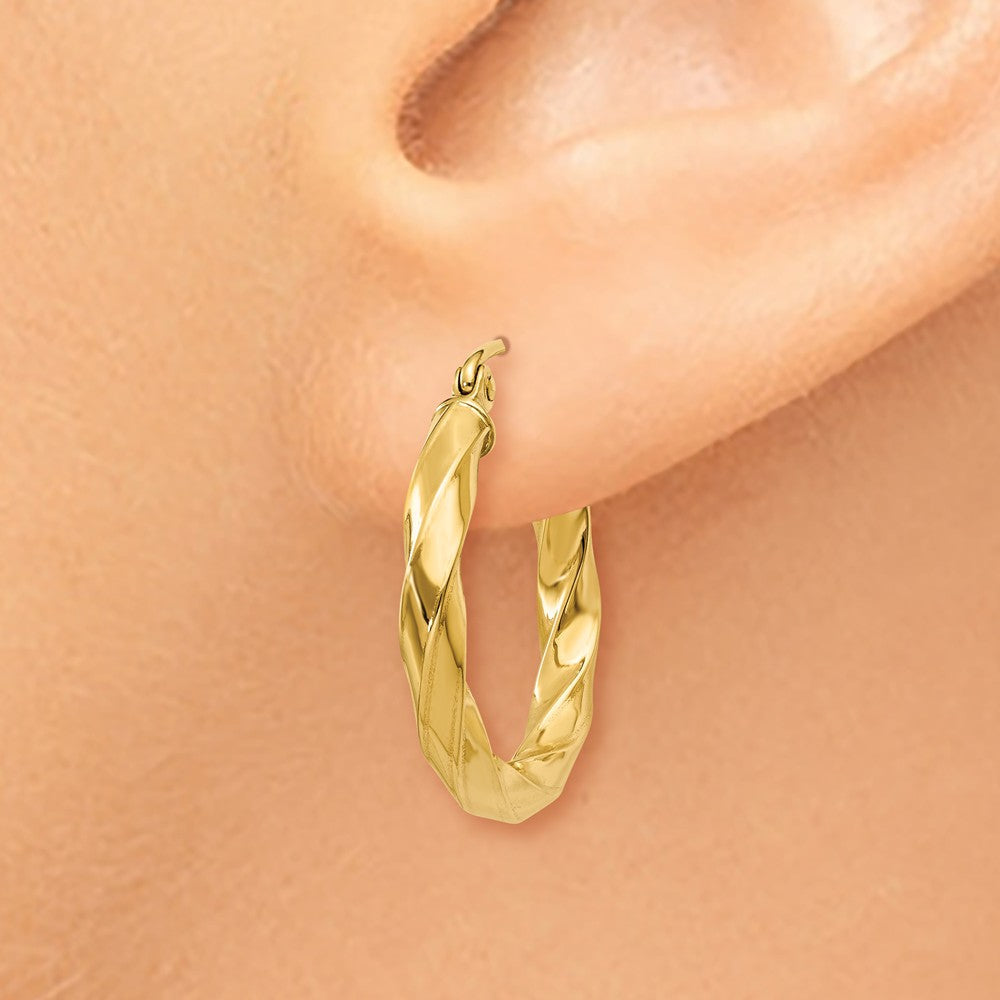 Alternate view of the 3mm x 22mm Polished 14k Yellow Gold Medium Twisted Round Hoop Earrings by The Black Bow Jewelry Co.